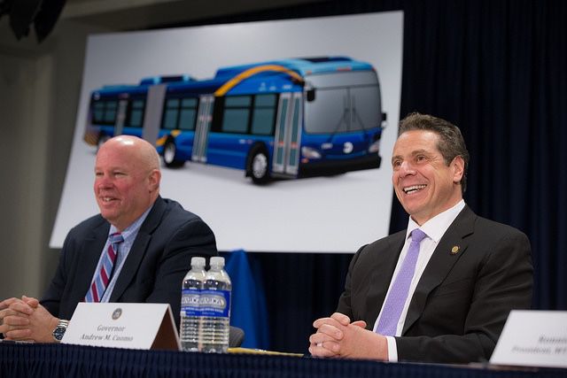Cuomo and Prendergast announcing new high-tech buses earlier this year (via Governor's Office).